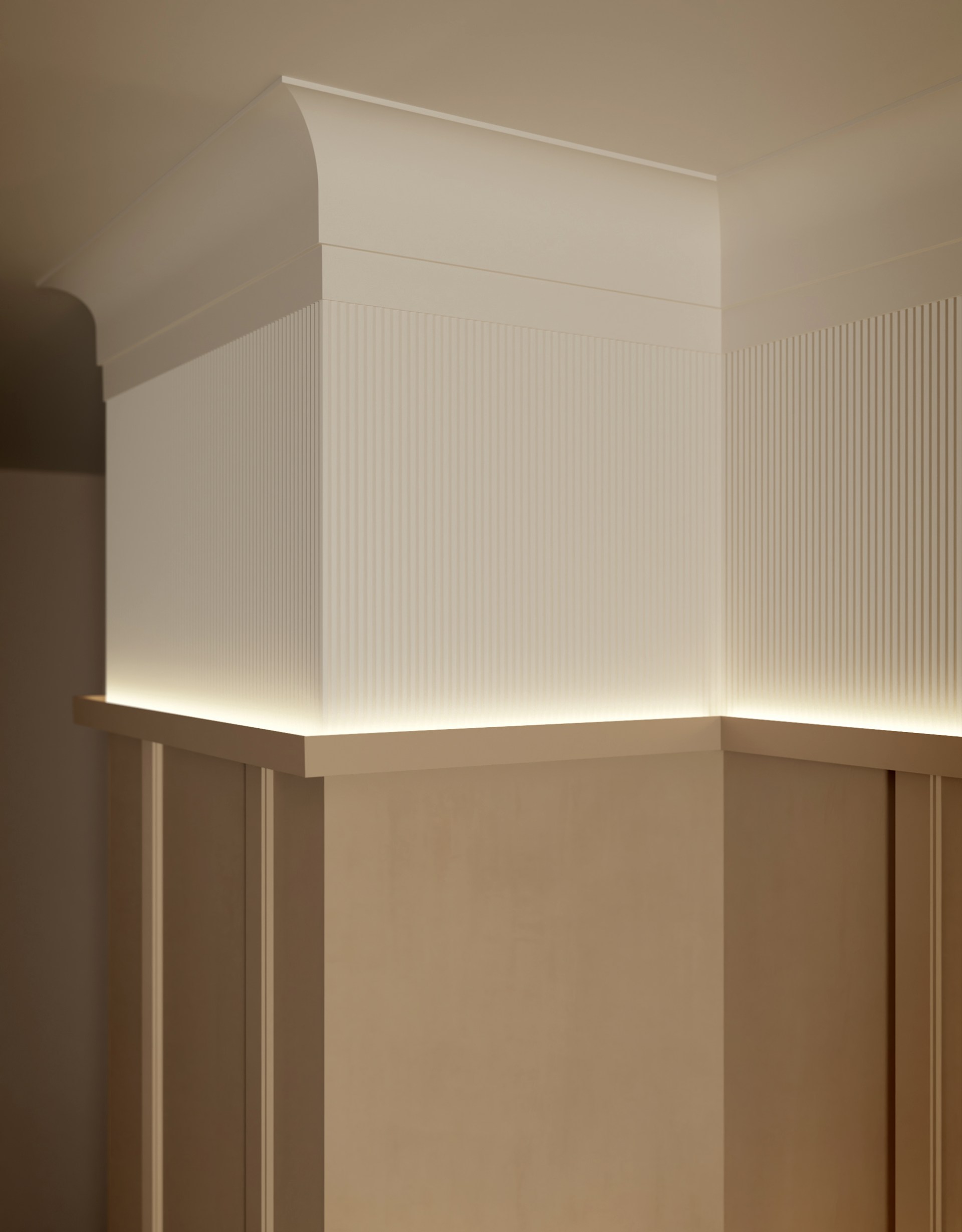 Perfil de moldura de techo arquitectónica combinado con elementos verticales de pared, lo que crea una transición elegante hacia el techo.
